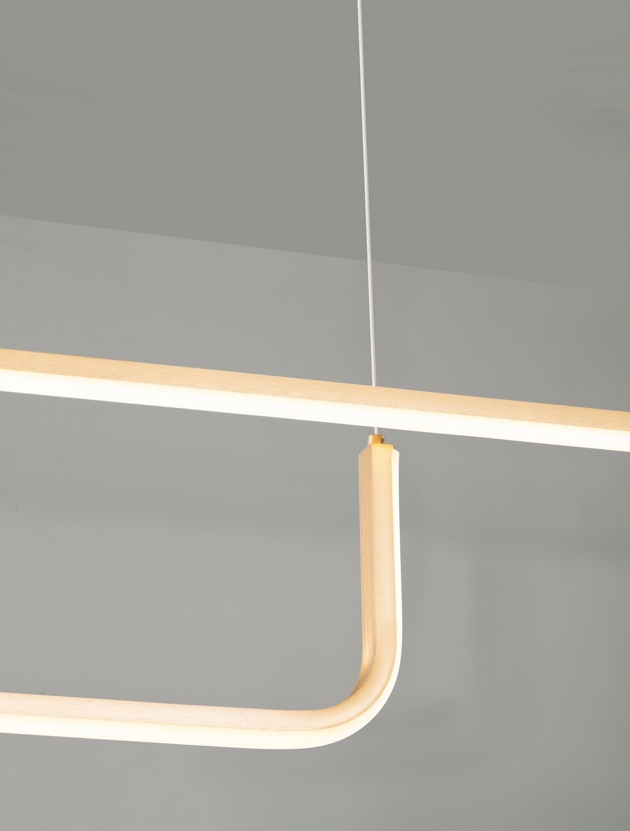 Lampa wisząca Piura 2xLED 40W w kolorze złotym, o nowoczesnym, prostym kształcie. Ujęcie zbliżeniowe na elementy konstrukcyjne, w tym lekko zakrzywioną część, zawieszoną na cienkim przewodzie. Tło w odcieniach szarości.