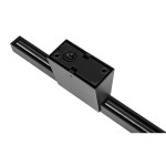 Kinkiet elewacyjny LED 9W, kolor czarny, z IP44. Widok z góry na obudowę z wbudowanym źródłem światła, o prostokątnym kształcie. Elementy montażowe widoczne na tle minimalistycznym.