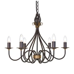 Lampa wisząca Windermere 6x E14 w kolorze złoto-brązowym, z sześcioma kloszami w kształcie świec. Posiada finezyjny kształt z metalowymi ramionami, zawieszona na łańcuchu. Idealna do eleganckich wnętrz.