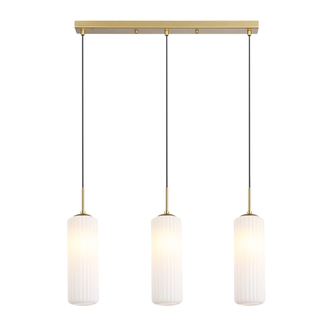 Lampa wisząca Vesta 3xE27 w kolorze złotym i białym. Składa się z trzech cylindrycznych kloszy z matowego szkła na smukłych, metalowych zawieszeniach. Ujęcie frontalne, lampa zawieszona na czterech cienkich linkach, z prostokątnym mocowaniem u góry.