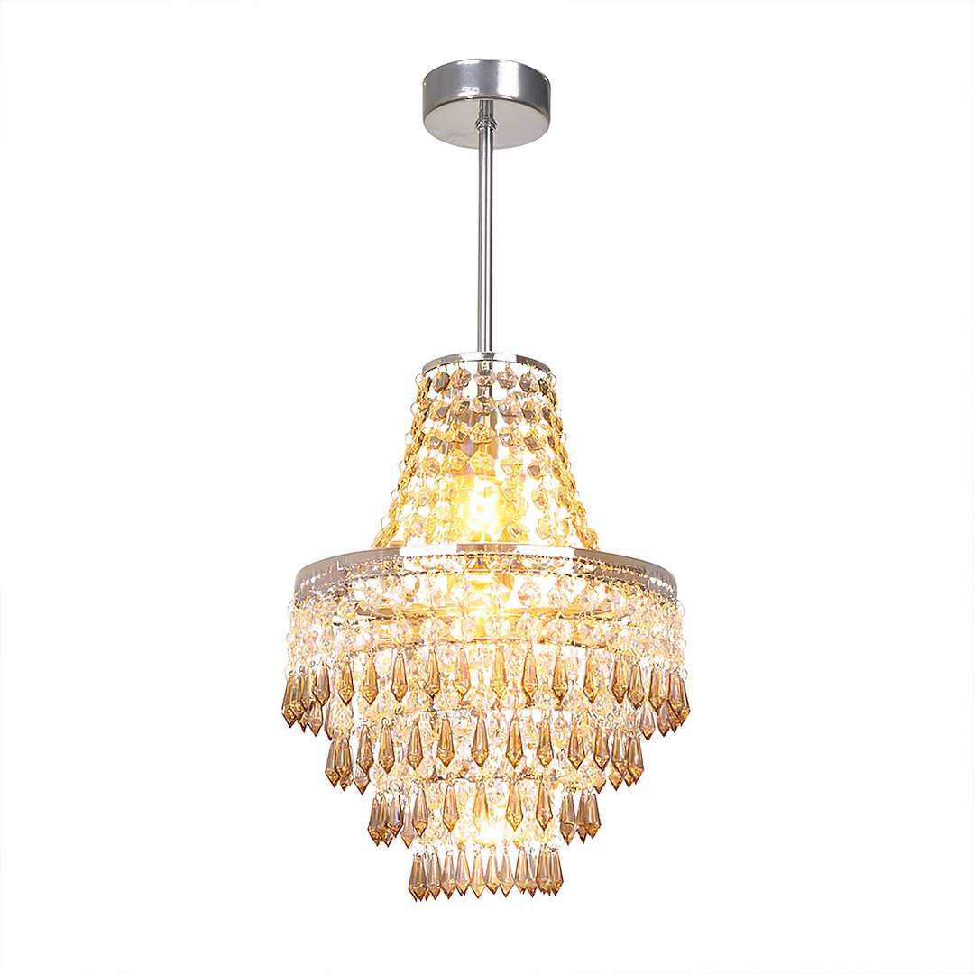 Lampa wisząca Gemma z chromowanym wykończeniem, zawieszona na cienkim drucie. Okrągła podstawa z błyszczącego metalu, ozdobiona kryształowymi elementami w kształcie kropli, emitującymi ciepłe światło. Wysoka, elegancka forma.