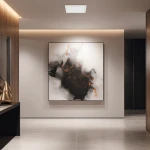 Plafon LED Evora Square 17x17 cm, biały, 12W CCT, zamontowany na suficie. W tle widoczna nowoczesna grafika w odcieniach czerni i pomarańczu. Prosty, kwadratowy kształt lampy, idealny do aranżacji wnętrz.