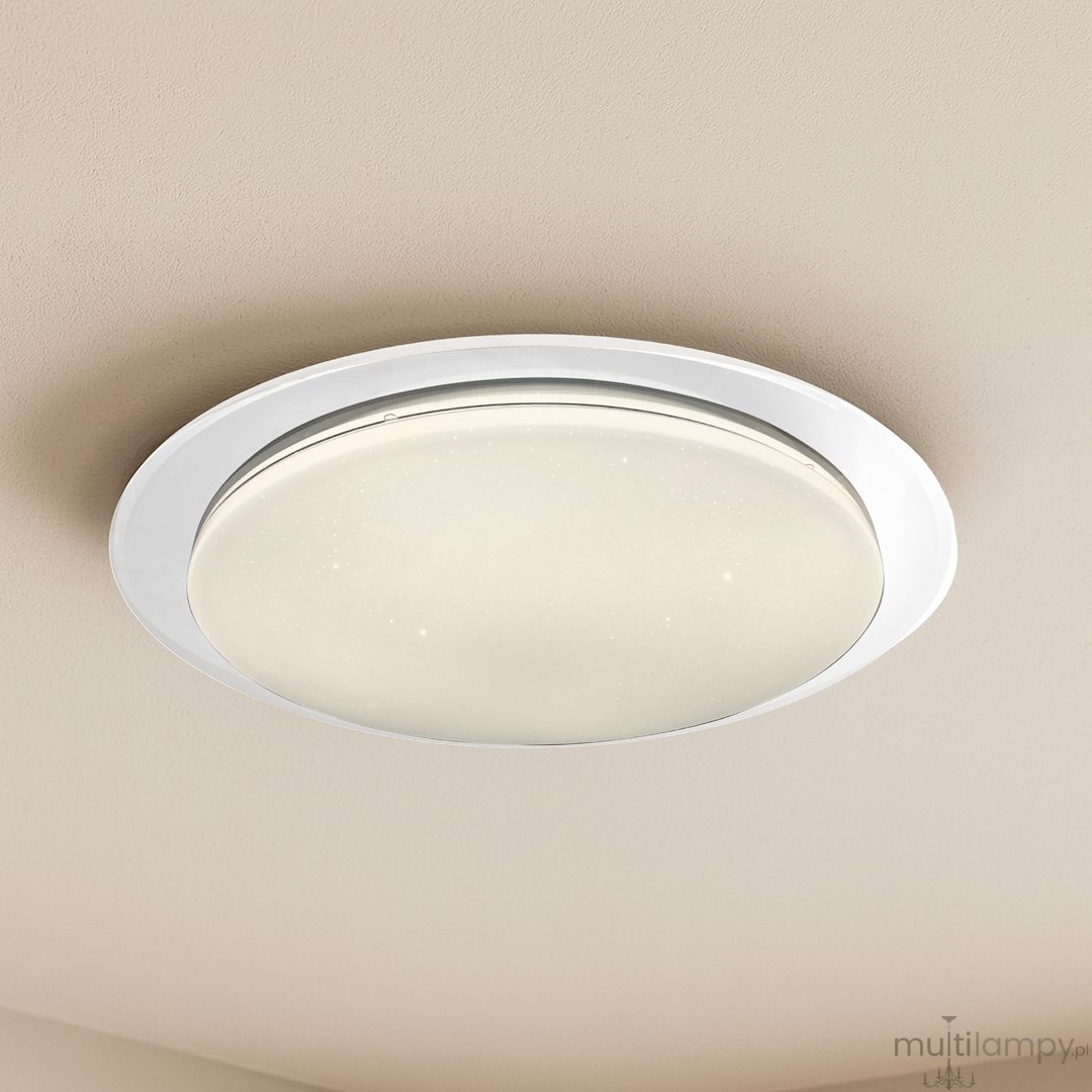 Plafon LED Sonic D85 100W w kolorze białym, o okrągłym kształcie, zamontowany na suficie. Szklany klosz z delikatnym wzorem, z możliwością zdalnego sterowania pilotem. Idealny do nowoczesnych wnętrz.