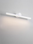 Kinkiet Rafael 1xLED 12W w kolorze białym, o prostokątnym kształcie, zamontowany na ścianie. Posiada okrągłą podstawę oraz wbudowane źródło światła LED, emitujące delikatne, ciepłe światło. Tło jasnoszare, minimalistyczne.