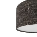 Lampa wisząca Amarela L z oprawą w czarnym melanżu, wykonana z materiału tekstylnego. Kształt cylindryczny, z białym wnętrzem. Widoczny element mocujący. Idealna do nowoczesnych wnętrz.