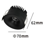 Oprawa do zabudowy z jedną diodą LED o mocy 7W w kolorze czarnym. Widok z góry, ukazujący średnicę 70 mm i wysokość 62 mm. Elementy montażowe w postaci sprężyn. Matowa powierzchnia z teksturą. Idealna do nowoczesnych wnętrz.
