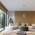 Kinkiet Karbon 30 w kolorze taupe, montowany na ścianie, z dwoma gniazdami GU10. Widoczny w nowoczesnym wnętrzu z roślinnymi dekoracjami, umieszczony obok okna, na tle drewnianej ściany.