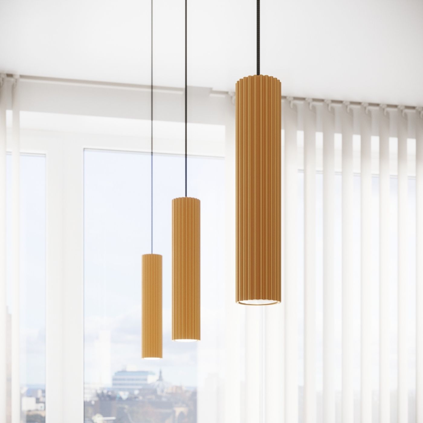 Lampa wisząca Karbon 1 z jedną oprawą GU10 w złotym kolorze. Posiada cylindryczny kształt z rowkowaną fakturą, zawieszona na czarnym kablu. Wisi w grupie trzech lamp o różnych wysokościach, na tle jasnego wnętrza z dużymi oknami.