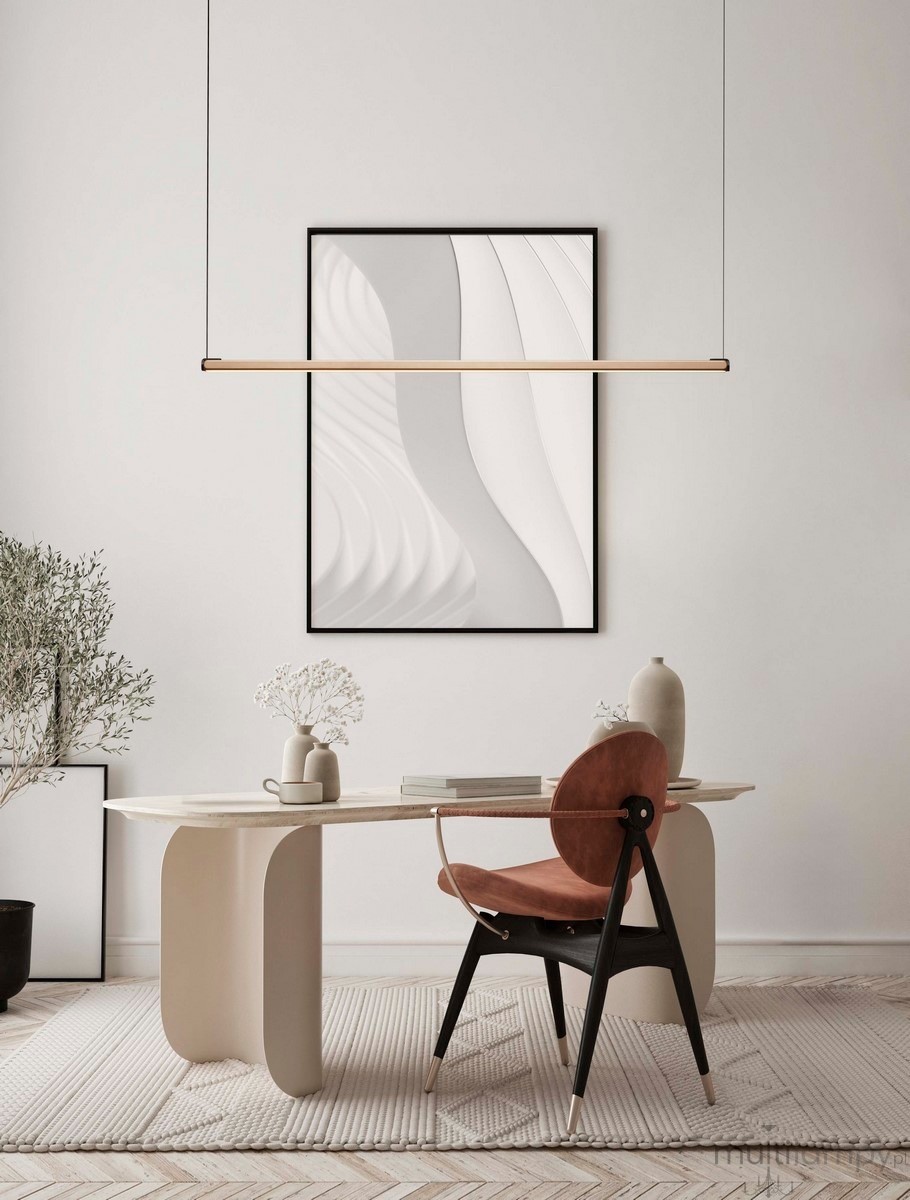 Lampa wisząca Calaca 1xLED 28W w kolorze czarnym, o prostej, minimalistycznej formie, zawieszona nad stołem. W tle nowoczesne obrazy i roślinność, na neutralnym tle.
