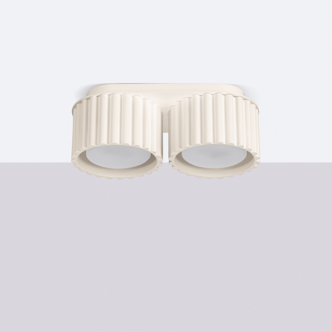 Beżowa lampa sufitowa Aura z dwoma oprawami na żarówki GX53, z charakterystycznymi żłobieniami na kloszach, montowana na płaskiej podstawie, widoczna z góry. Idealna do nowoczesnych wnętrz.