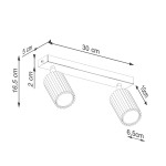 Lampa sufitowa Karbon w kolorze złotym, wyposażona w dwa spoty GU10, montowana na prostokątnej podstawie. Wymiary: długość 30 cm, szerokość 6,5 cm, wysokość 16,5 cm. Wzór z rowkami na lampach.