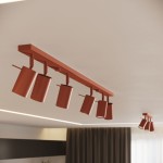 Lampa sufitowa Ring w kolorze ochra czerwona, z sześcioma regulowanymi reflektorami GU10 zamocowanymi na prostokątnej podstawie. Ujęcie z dołu, ukazujące kształt i detale kloszy. Idealna do oświetlenia nowoczesnych wnętrz.