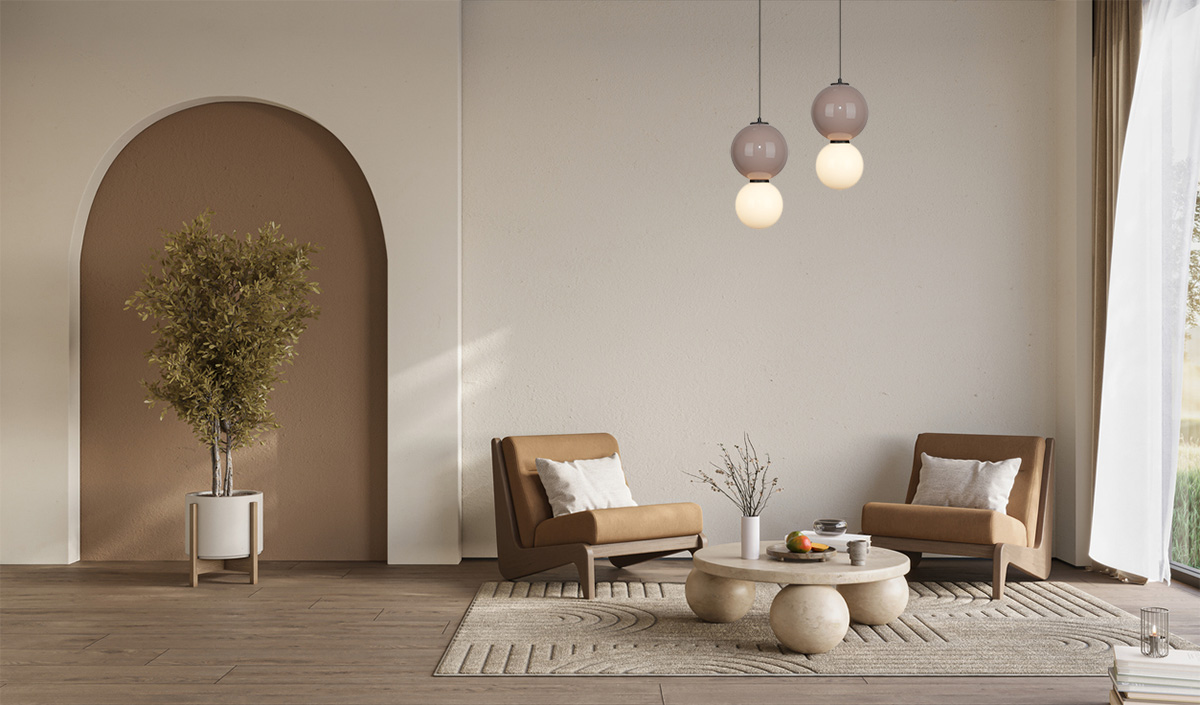 Lampa wisząca LED Pieve D18 o mocy 6W, barwie światła 3000K, w brązowej obudowie. Zawieszona w aranżacji wnętrza, obok dwóch brązowych foteli i okrągłego stołu. W tle jasna ściana z łukiem oraz roślinność w donicy.