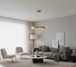 Lampa wisząca Giulia D60 LED w kolorze złotym, umieszczona w nowoczesnym wnętrzu. Okrągła oprawa na cienkich linkach, zawieszona nad stolikiem kawowym w eleganckim salonie z szarymi i beżowymi akcentami.
