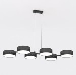 Lampa wisząca Drumz 6xE14 w kolorze czarnym, z sześcioma okrągłymi kloszami, zawieszona na długich linkach. Klosze mają matowe białe wnętrze, co zapewnia równomierne oświetlenie. Montaż na suficie, prosty, nowoczesny design.
