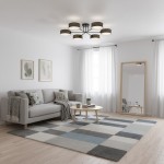Lampa sufitowa Maga 6xE14 w kolorze brązowym, z sześcioma okrągłymi kloszami, zamontowana na czarnym stelażu. Widok z góry, w aranżacji nowoczesnego wnętrza z szarym sofą i okrągłym stolikiem na tle jasnych ścian.