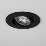 Ruchoma oprawa podtynkowa GU10 w kolorze czarnym, zamontowana w suficie, z widoczną szklaną żarówką w kształcie stożka. Oprawa ma okrągły kształt i matowe wykończenie, co podkreśla nowoczesny styl.