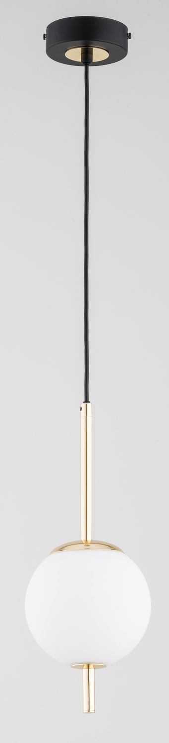 Lampa wisząca Diora w kolorze czarno-złotym, z metalowym uchwytem i białym, okrągłym kloszem. Zawieszona na cienkim, czarnym przewodzie. Prosta, elegancka konstrukcja, idealna do nowoczesnych wnętrz.