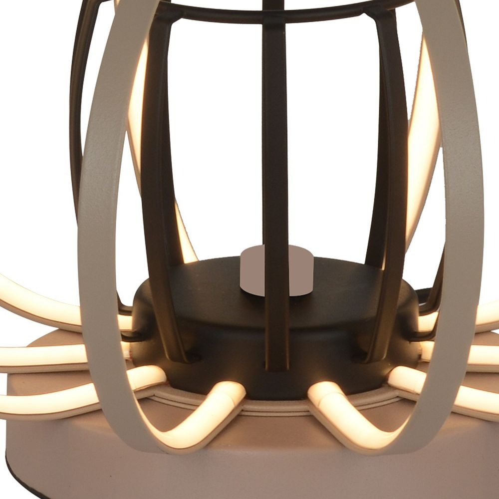 Lampa stołowa Salo 1xLED 18W w kolorze piaskowym i czarnym, z metalową, otwartą konstrukcją oraz wyraźnymi, elastycznymi elementami świetlnymi. Ujęcie z bliska na podstawę i klosz lampy.