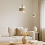 Beżowa lampa wisząca Valentino (1xE27) z przezroczystymi i matowymi elementami, zawieszona w nowoczesnym wnętrzu. Lampa ma cylindryczny kształt i dekoracyjne wykończenie, w komplecie z minimalistycznym otoczeniem na jasnym tle.