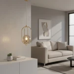 Lampa wisząca Binar 1-punktowa w kolorze złotym, z przezroczystym kloszem w kształcie kuli zawieszona na cienkim kablu. W tle jasna kanapa i stół, na którym znajduje się roślina doniczkowa oraz książki.