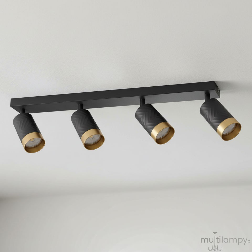 Lampa sufitowa Arras w kolorze czarnym i złotym, z czterema reflektorami typu GU10. Reflektory mają teksturowaną powierzchnię i złote obrzeża. Produkt zamontowany na prostokątnej podstawie, widok z góry.