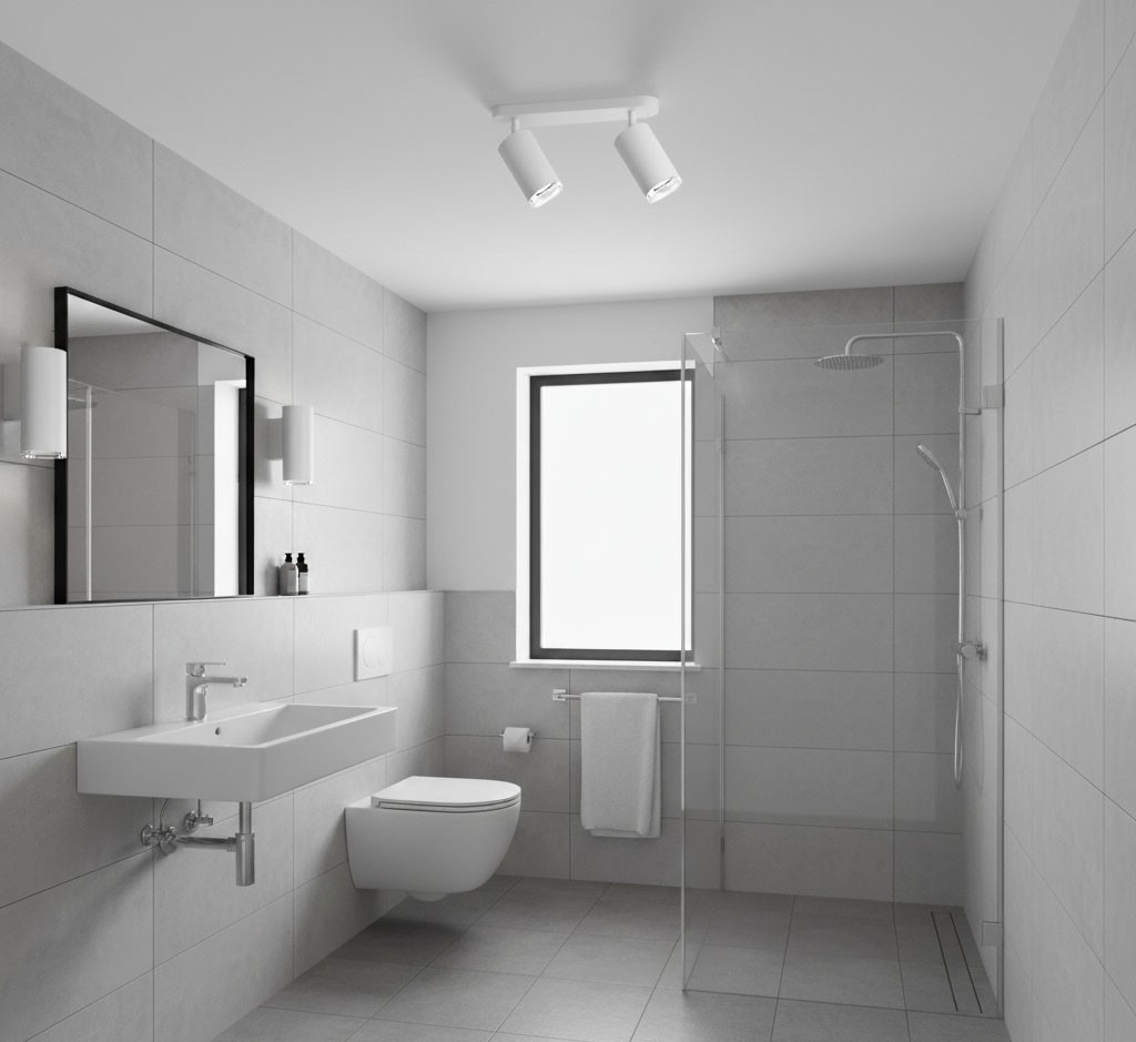Lampa sufitowa Turyn IP44 w kolorze białym z podwójnym spotem, zamontowana na suficie w łazience. Dwa ruchome źródła światła skierowane w dół. Nowoczesne wykończenie w minimalistycznym wnętrzu z szarymi płytkami.
