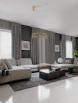 Lampa wisząca Huaraz D65 w kolorze złotym z jedną diodą LED 26W, zawieszona na cienkich linkach w nowoczesnym wnętrzu. W tle widoczne szare zasłony oraz minimalistyczne meble.
