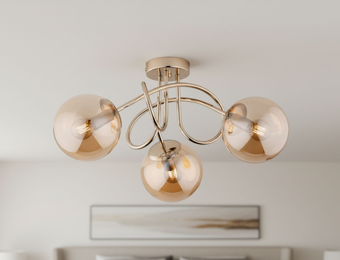 Lampa sufitowa Banko z trzema żarówkami E14 w antycznym złocie. Szklane klosze w odcieniu złotym, o zaokrąglonym kształcie, zawieszone na eleganckich, metalowych ramionach. Produkt montowany do sufitu, w nowoczesnym stylu.