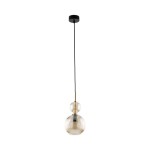Lampa wisząca Sophia 1xE14 w bursztynowym kolorze, z przezroczystym kloszem o żłobionej fakturze. Zawieszona na czarnym przewodzie, z metalowym elementem w złotym kolorze. Prosta, nowoczesna forma, idealna do różnych aranżacji wnętrz.