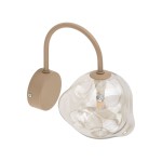 Lava Sabia kinkiet 1xG9 w kolorze beżowym. Lampa z przezroczystym kloszem o organicznym kształcie, zamontowana na beżowym uchwycie. Widoczny gwint do żarówki G9, zwrócona w prawo, idealna do oświetlenia wnętrz.