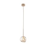 Beżowa lampa wisząca Lava Sabia z jedną oprawą G9. Produkt ma szklany klosz w organicznym kształcie, zawieszony na cienkim przewodzie. Ujęcie frontalne, na jednolitym tle, ukazujące detal lampy oraz jej subtelną fakturę.