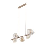 Lampa wisząca Lava Sabia w kolorze beżowym z siedmioma oprawami G9, zawieszona na prostokątnej podstawie. Szklane klosze o organicznym kształcie, rozmieszczone asymetrycznie na metalowym pręcie.