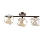 Lava Brown lampa sufitowa 3xG9 w kolorze brązowym. Trzy klosze w kształcie organicznych brył z przezroczystego szkła, zamontowane na metalowej listwie. Ujęcie frontalne, lampa wisząca, w nowoczesnym stylu.