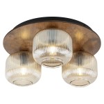 Brązowa lampa sufitowa Salvia Brown z trzema kloszami z przezroczystego szkła o żłobionej fakturze, zamontowana na okrągłej drewnianej podstawie. Klosze mają okrągły kształt, emitując miękkie światło.