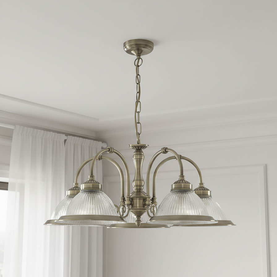 Lampa wisząca American Diner 5-punktowa w antycznym mosiądzu, z pięcioma szklanymi kloszami o teksturowanej powierzchni. Ujęcie frontalne, z zawieszeniem na łańcuchu, idealna do nowoczesnych wnętrz.