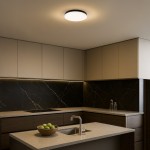 Maya LED D33 plafon w kolorze czarnym, o średnicy 33 cm i mocy 15W, umieszczony na suficie w nowoczesnej kuchni, oświetlający przestrzeń. Widoczny minimalistyczny design i neutralne światło 4000K.