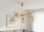 Lampa wisząca Primery Gold z pięcioma kloszami E14 w kolorze złotym. Klosze mają półprzezroczystą, szklaną strukturę, a całość jest zawieszona na metalowej konstrukcji z wykończeniem w kolorze złota.