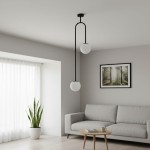 Lampa wisząca Vector 2xE14 w kolorze czarnym i białym, z dwoma okrągłymi kloszami, zawieszona na długich, zakrzywionych ramionach. Ujęcie frontalne, umieszczona w nowoczesnym wnętrzu z kanapą i rośliną doniczkową.