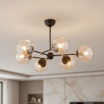 Lampa wisząca Itoris 6-punktowa 60818 z sześcioma przezroczystymi kloszami, metalową konstrukcją w kolorze czarnym. Ujęcie z dołu, montowana sufitowo, idealna do nowoczesnych wnętrz. Tło jasne, minimalistyczne.