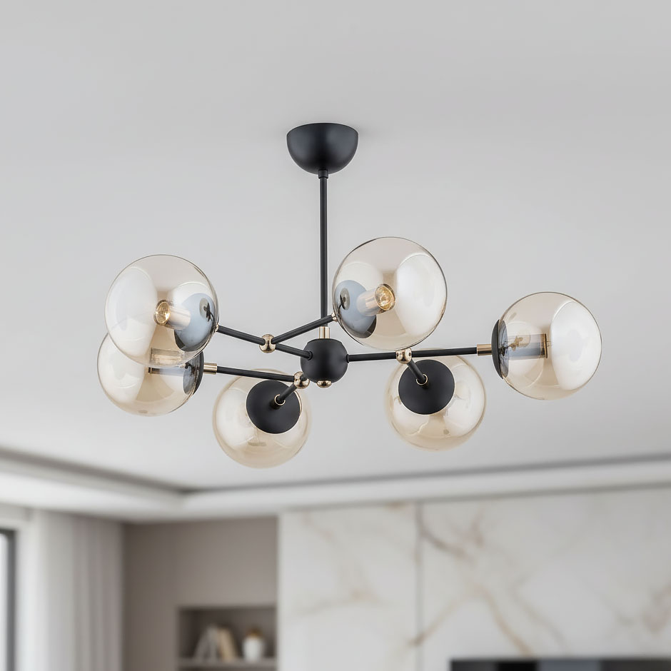 Lampa wisząca Itoris 6-punktowa w czarnej metalowej konstrukcji z sześcioma przezroczystymi, okrągłymi kloszami w kolorze brązowym. Klosze zamocowane na rozłożystych ramionach, montowana sufitowo, w nowoczesnym stylu.