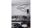Proxima lampa wisząca LED 40W + 24W CCT w kolorze czarnym, z podwójnym okręgiem, zawieszona nad elegancką kanapą w nowoczesnym wnętrzu. Lampa ma minimalistyczny design, z wyraźnym oświetleniem LED, idealna do salonu.