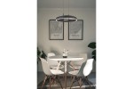 Lampa wisząca LED Coltrain 32W CCT w kolorze czarnym, zamontowana nad okrągłym białym stołem. W tle widoczne dwa obrazy oraz roślinność. Prosta, nowoczesna forma o okrągłym kształcie, zawieszona na dwóch linkach.