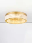 Złota lampa sufitowa Yotau z jednym źródłem LED o mocy 46W, okrągła konstrukcja z przezroczystymi kryształkami, montowana na suficie, z delikatnym, eleganckim wykończeniem. Idealna do nowoczesnych wnętrz.