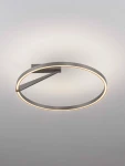 Lampa sufitowa Zudanez 1xLED 44W CCT w kolorze niklowym, o okrągłym kształcie z subtelnym podświetleniem LED. Ujęcie z góry, zamontowana na suficie, w minimalistycznym stylu, idealna do nowoczesnych wnętrz.