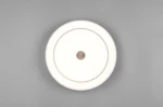 Lampa sufitowa Keaton w kolorze szarym, o okrągłym kształcie, z białym, podświetlanym kloszem i metalowym, okrągłym przyciskiem w centralnej części. Ujęcie z góry, na jednolitym szarym tle, prezentujące nowoczesny design i minimalistyczny styl.