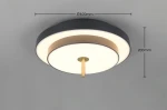 Lampa sufitowa Keaton 1xLED 34,5W CCT w kolorze czarnym i złotym. Okrągła konstrukcja o średnicy 400 mm i wysokości 200 mm, z centralnym elementem w złotym kolorze. Delikatne podświetlenie LED, nowoczesny design.