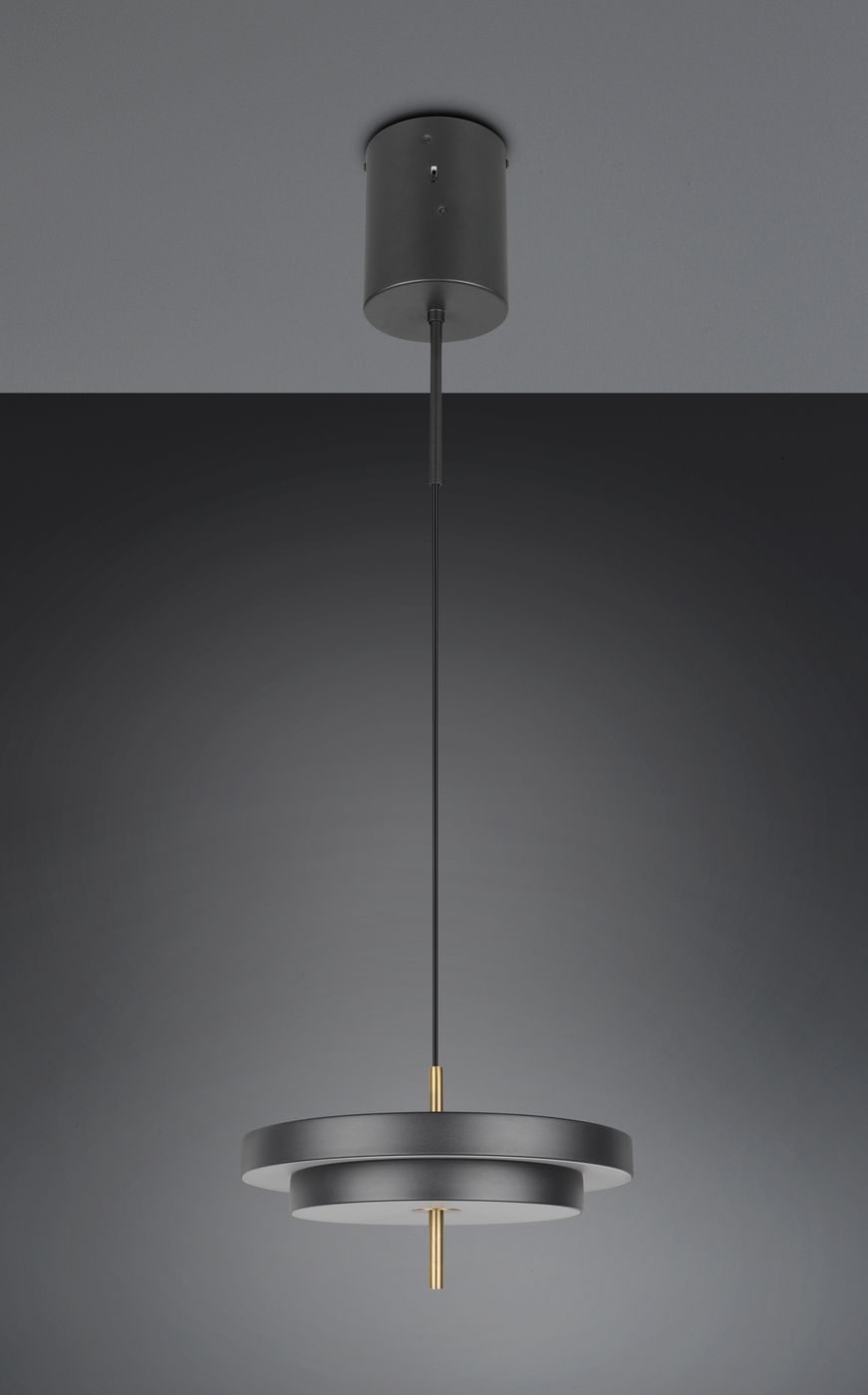 Lampa wisząca Keaton w kolorze czarnym i złotym, z podwójnym okrągłym kloszem oraz metalowym uchwytem. Zawieszona na cienkim przewodzie, w eleganckim, nowoczesnym stylu. Wymiary klosza: średnica około 34,5 cm. Idealna do wnętrz.