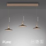 Lampa wisząca Pure Moon z 6 diodami LED, w kolorze czarnym i złotym, zawieszona na prostokątnej podstawie. Trzy klosze o okrągłym kształcie regulowanej wysokości, z metalowymi elementami. Tło w odcieniach szarości.