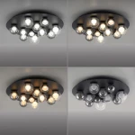 Lampa sufitowa Pure Popup w kolorze grafitowym z 11 żarówkami LED o mocy 33W. Okrągła, wisząca konstrukcja z różnymi odcieniami światła, z pilotem do zdalnego sterowania. Ujęcie z góry, na jednolitym tle.